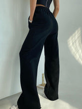 Women's solid color sports style casual loose tie wide leg pants