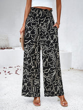 Women's elegant geometric print loose trousers