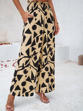 Women's elegant geometric print loose trousers