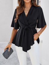 Women's solid color elegant short sleeve strappy tunic top