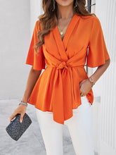 Women's solid color elegant short sleeve strappy tunic top