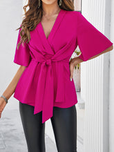 Women's solid color elegant short sleeve strappy tunic top