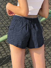 New hot girl street retro distressed low waist asymmetric pocket workwear casual shorts