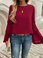 Women's loose flared long-sleeved top